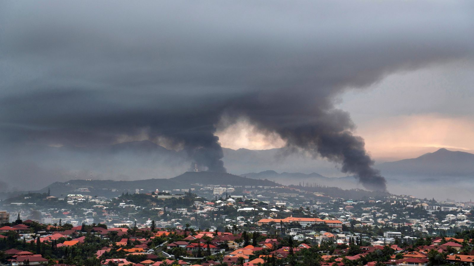 Macron heads to New Caledonia as Australia and New Zealand evacuate