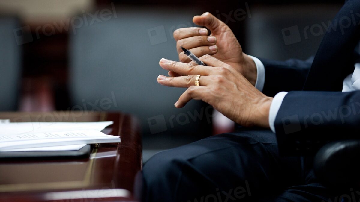 White House interior with officials meeting